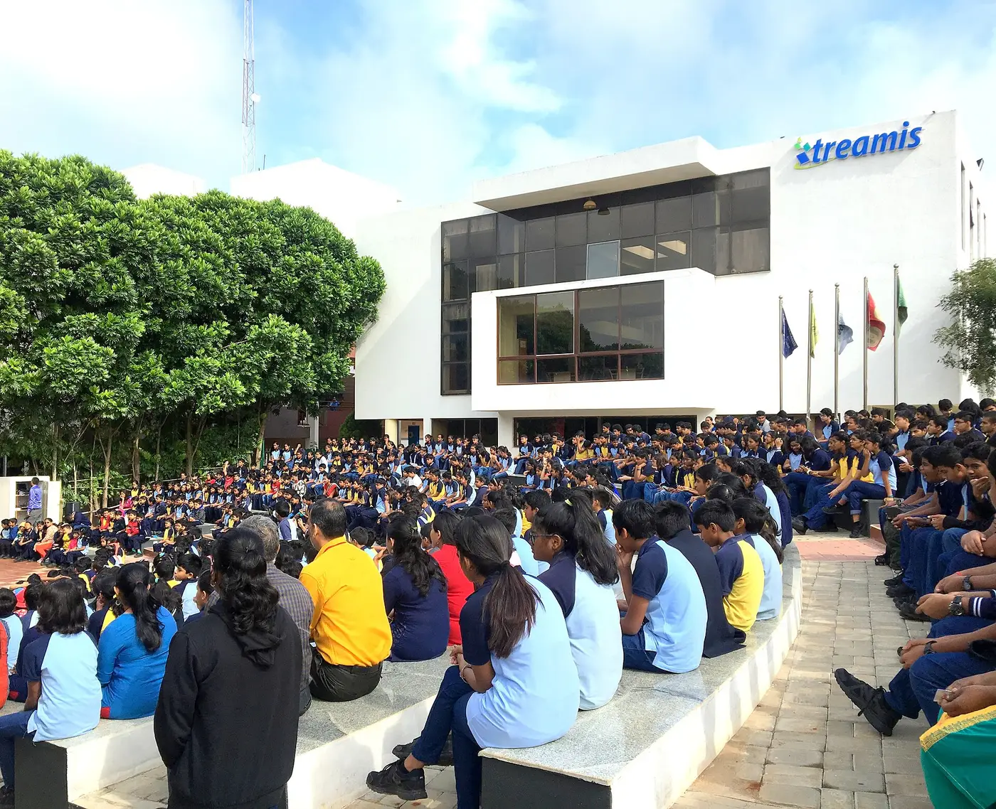 Students gathered in a school amphitheatre